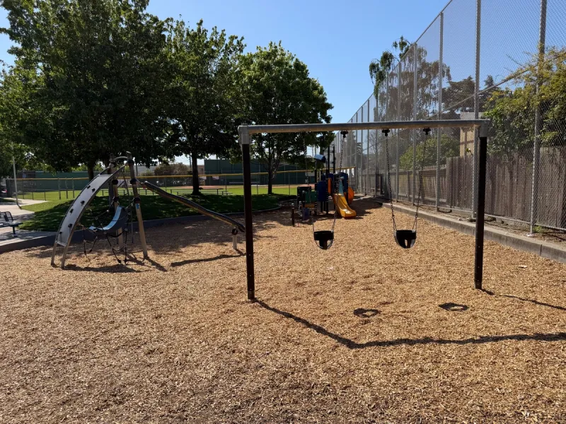 Toddler swings and 2 small play structures