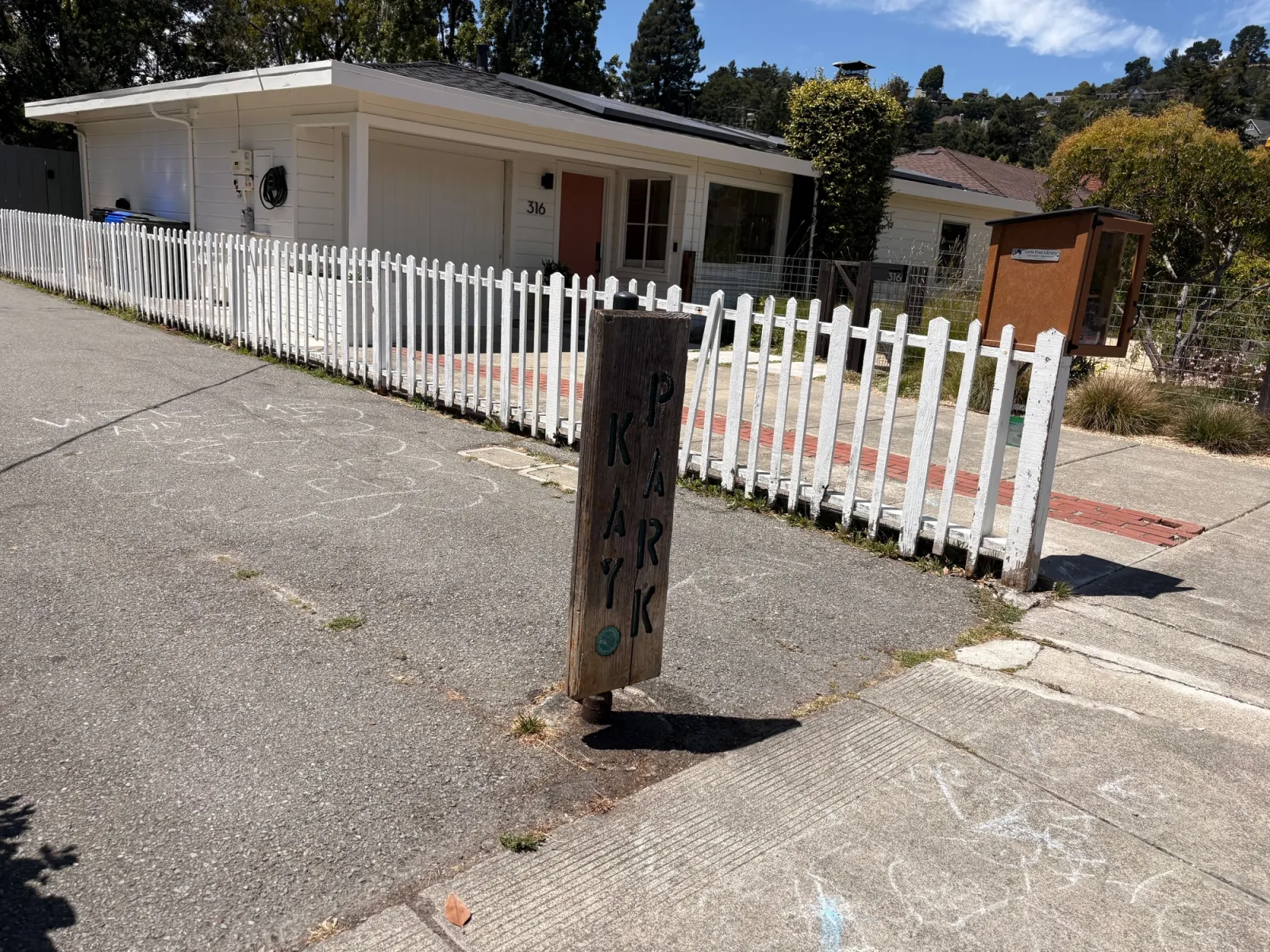 Entrance into the park is centered by this sign