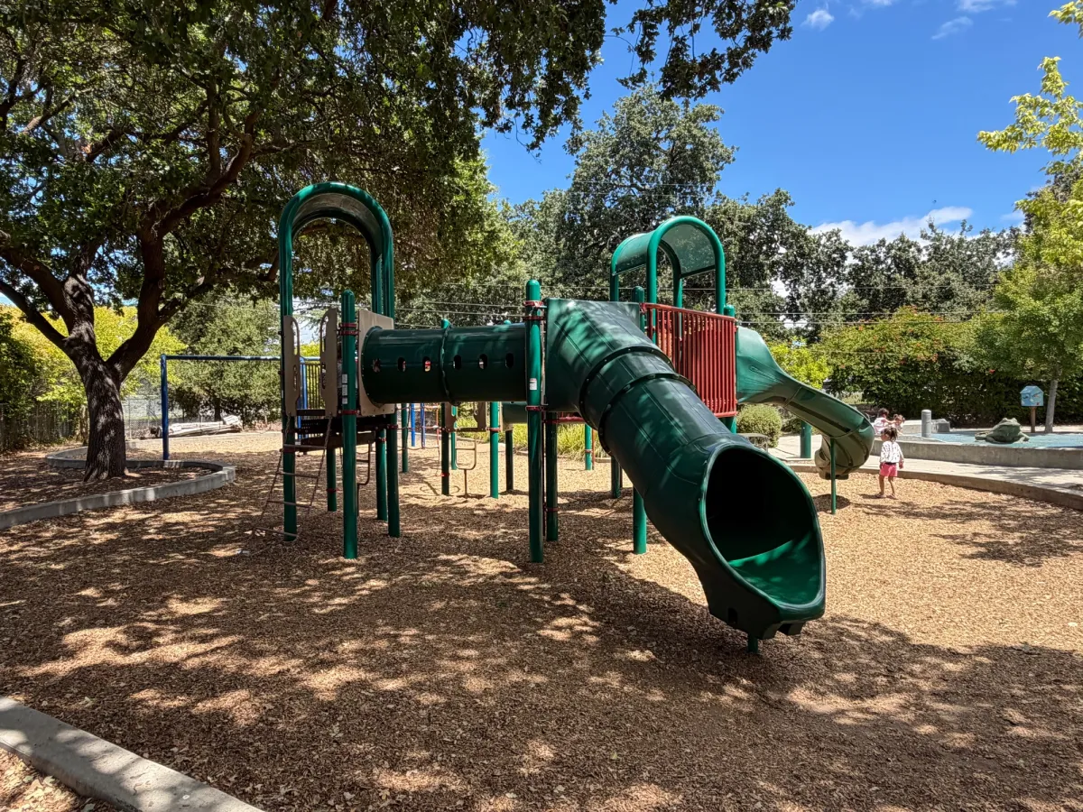 Big kid play area features big slides, tunnels, and swings