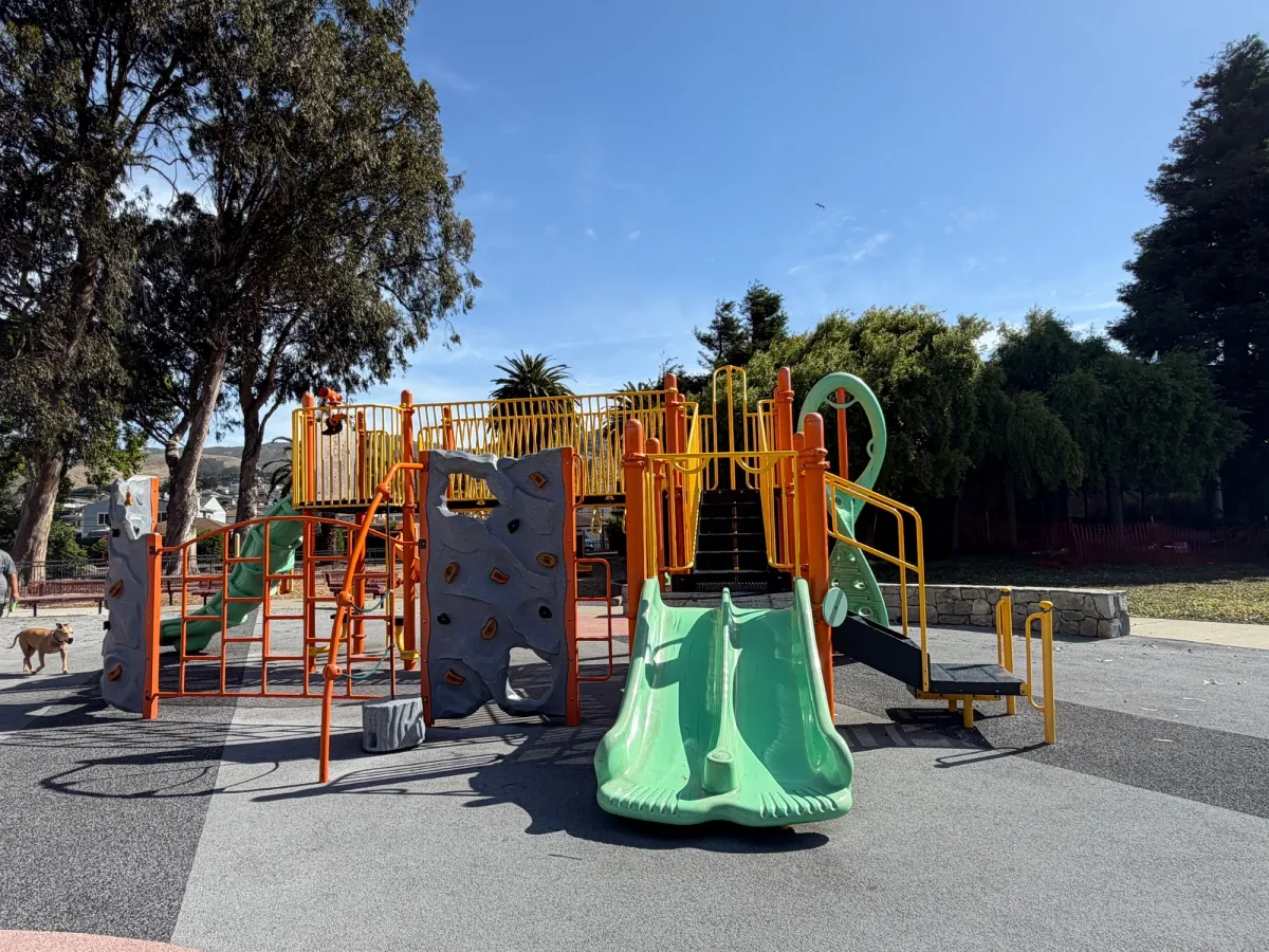 Lots to do on the older kid playstructure slide with fun slides and climbing areas