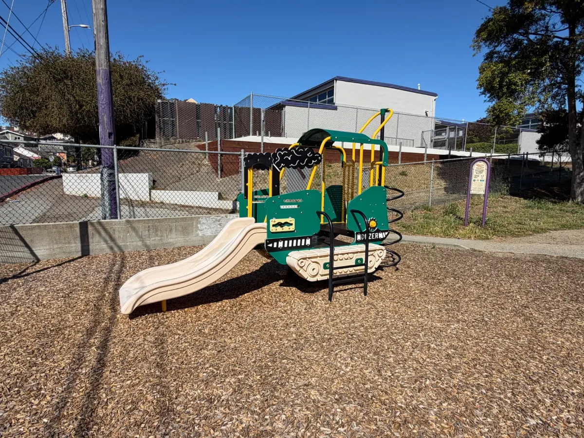 Adorable bulldozer themed play structure