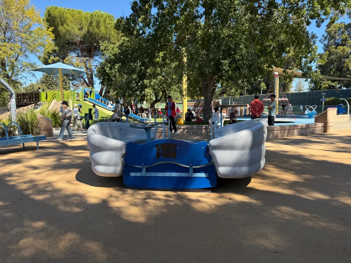 Wheelchair accessible sway swing