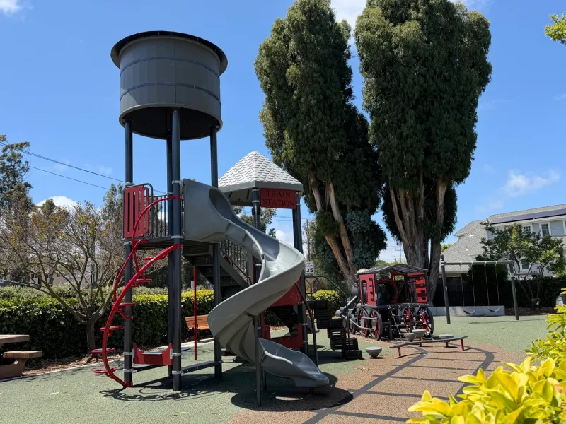 Play Water tower acts as shade cover, leading to the slide