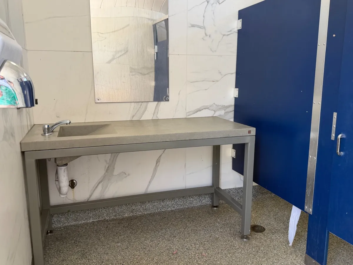 Bathroom sink counter can double as changing station