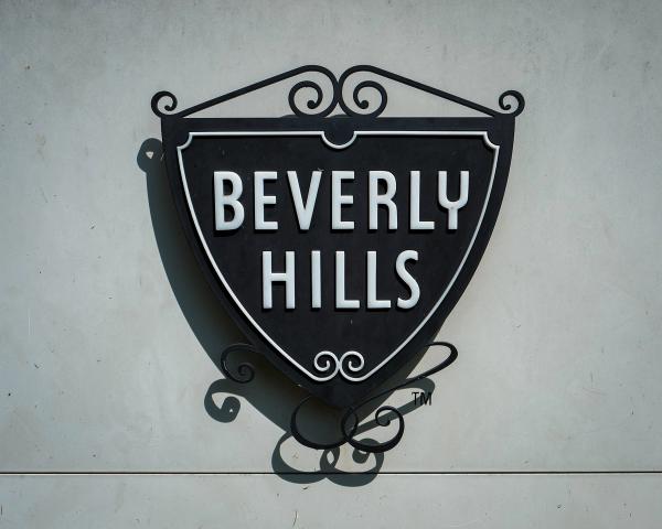 Beverly Hills crest on a white wall