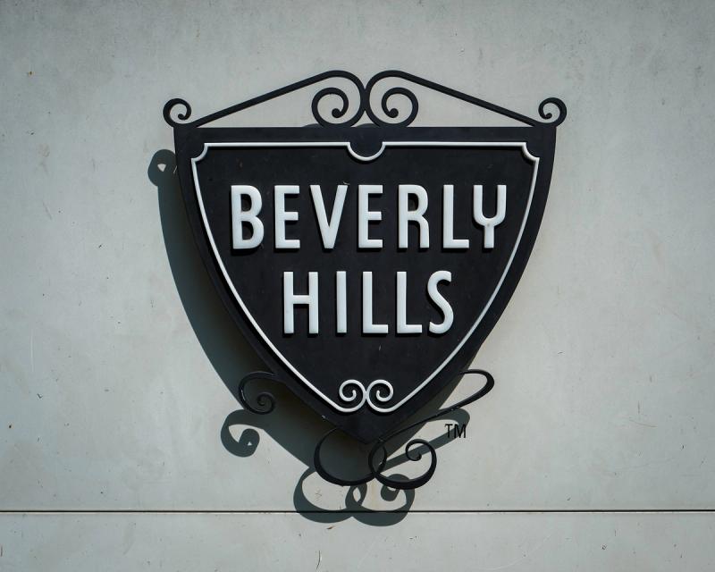 Beverly Hills crest on a white wall