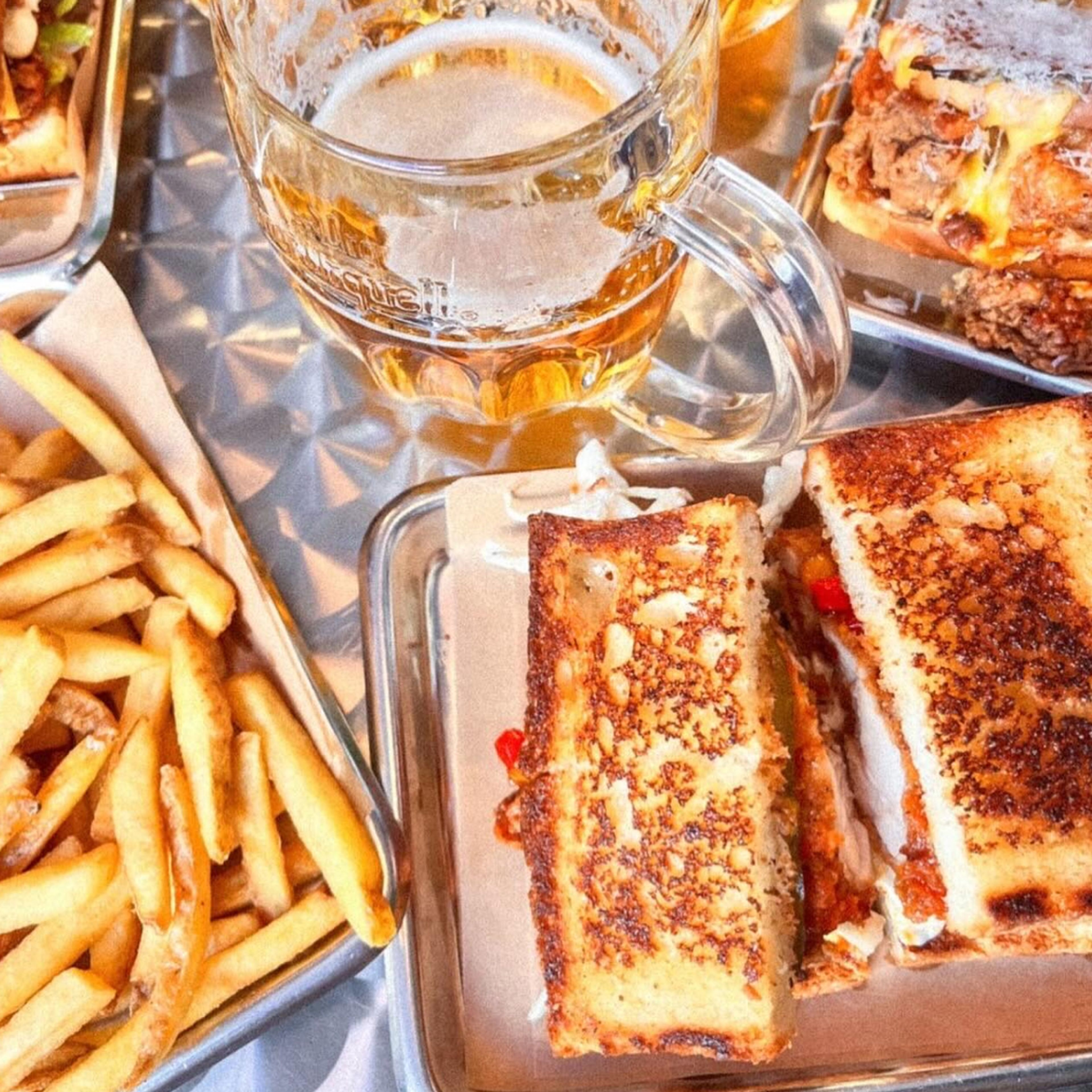 Sandwiches, fries and beer