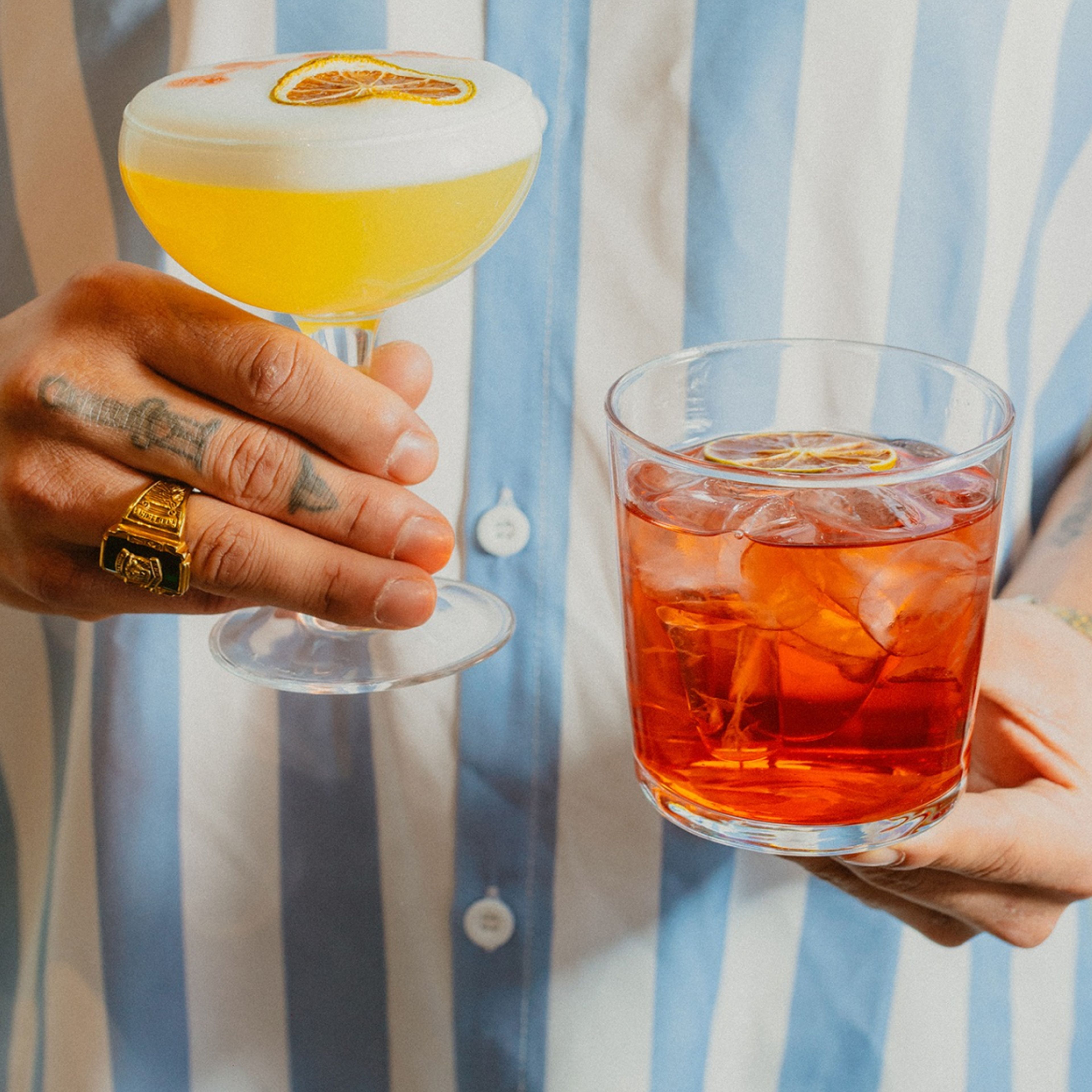 Man holding cocktails