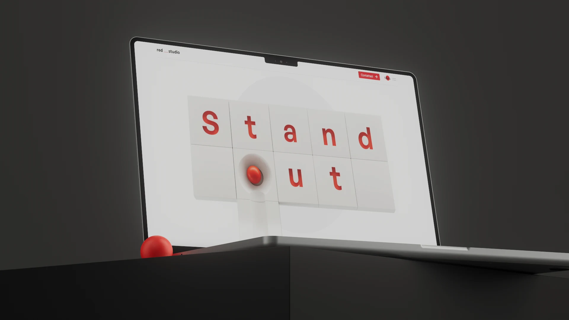 Render 3D di un laptop che mostra la homepage del sito Red Studio con una sfera rossa e la scritta “Stand out”