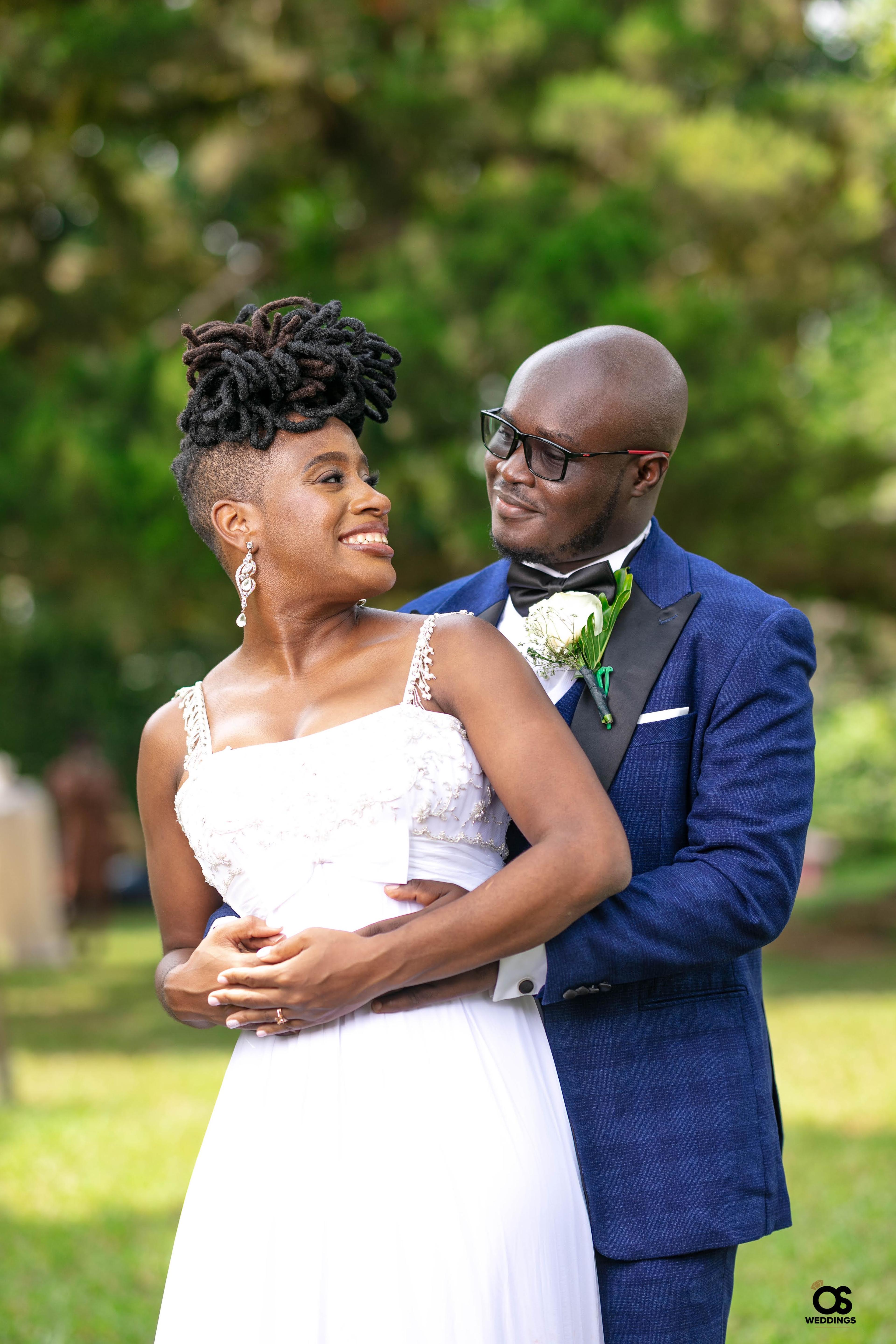 Bride and groom sharing a portrait during their wedding celebration.