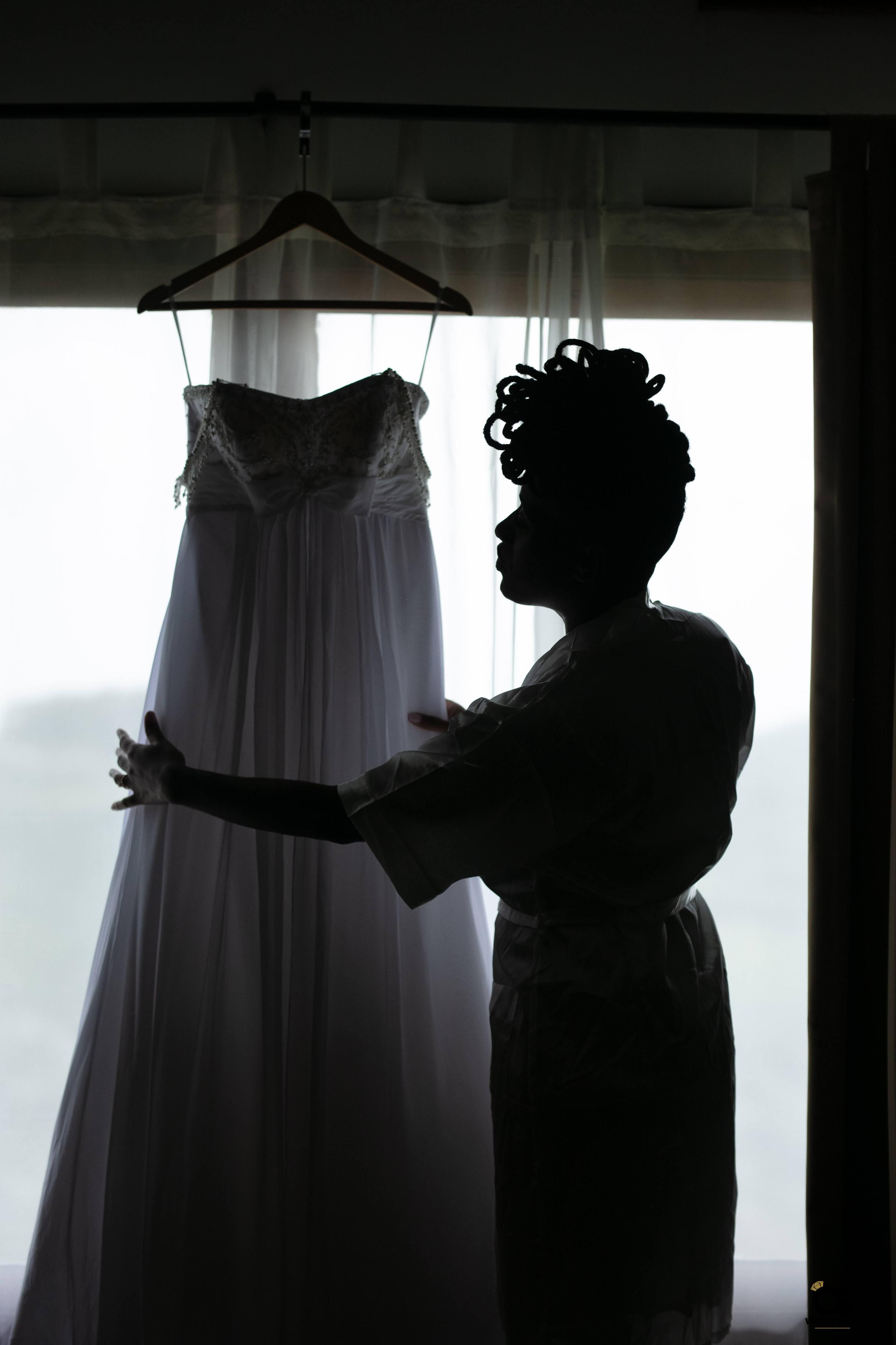 Bride getting ready during wedding preparations.