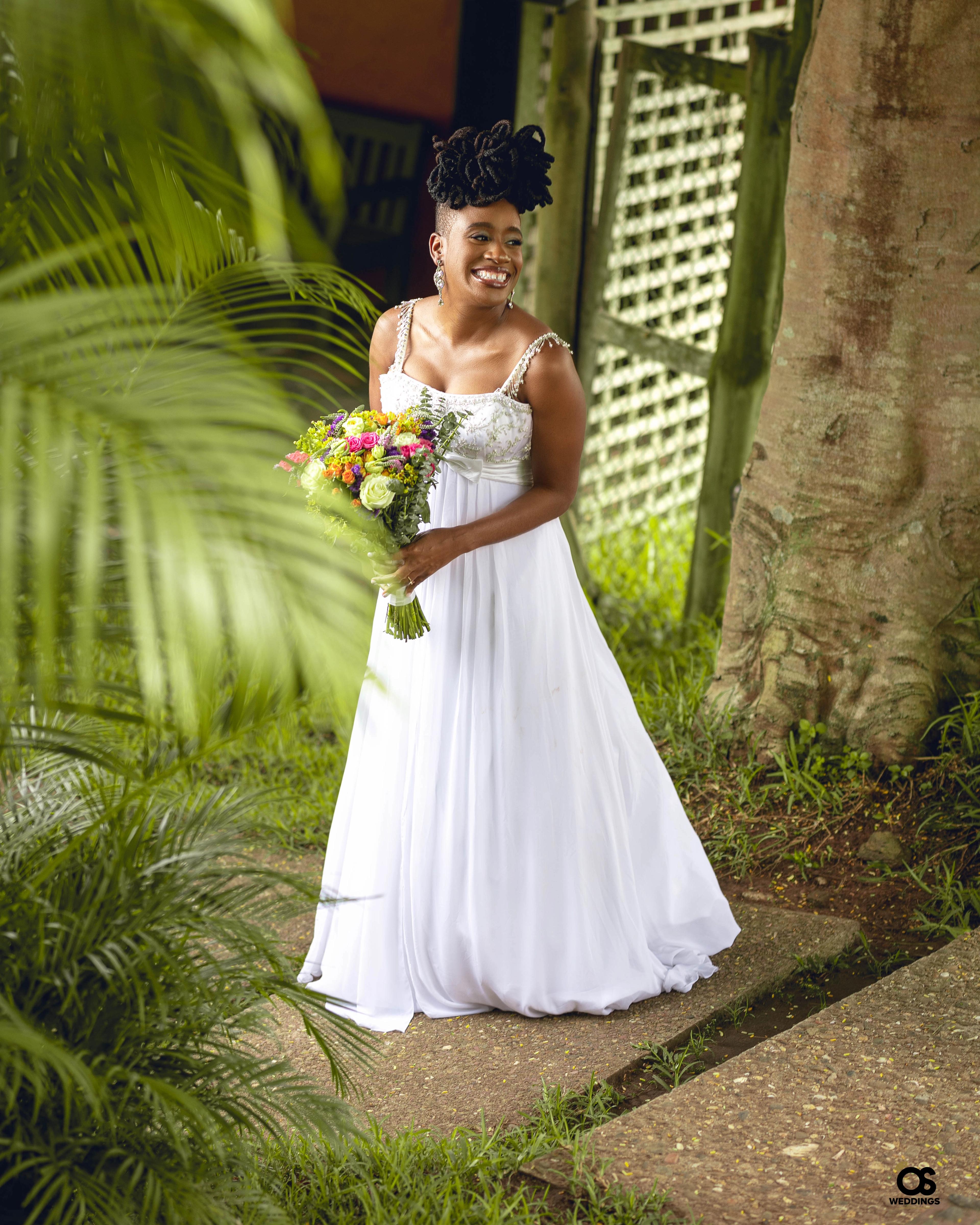 Bride standing in her wedding gown during bridal portraits.