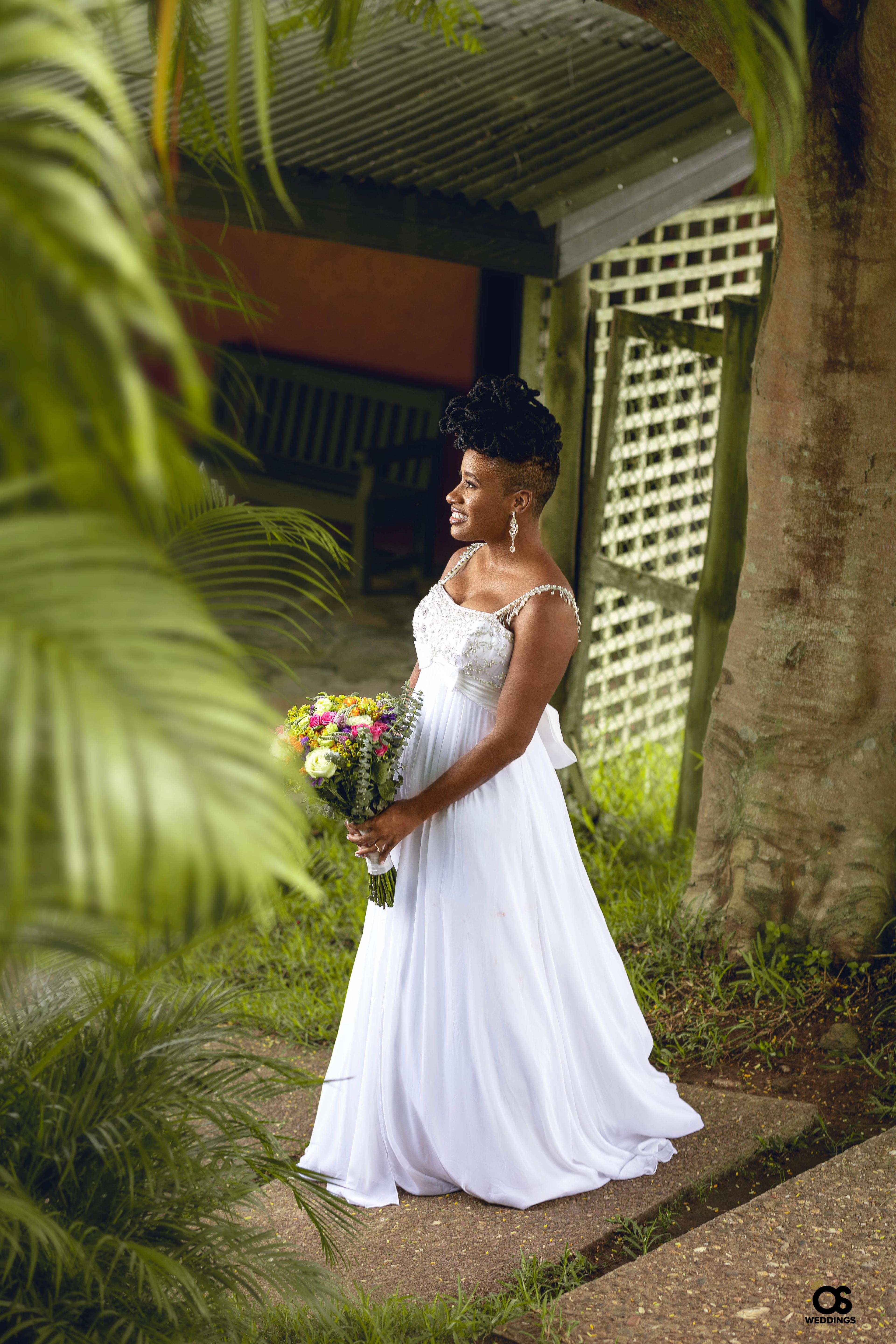 Bride walking through the garden during portrait session.