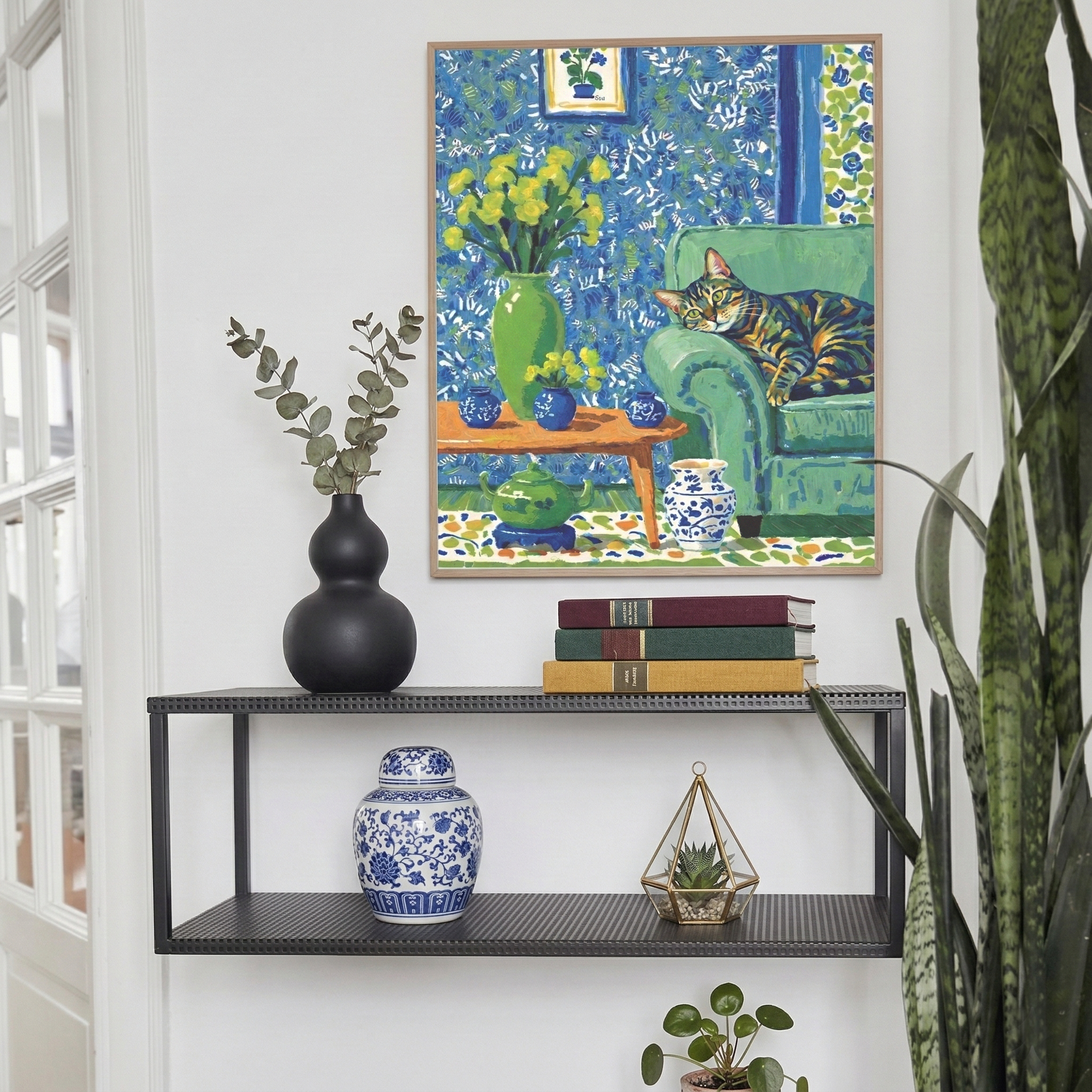 pet portrait on styled shelf with books plants and decor