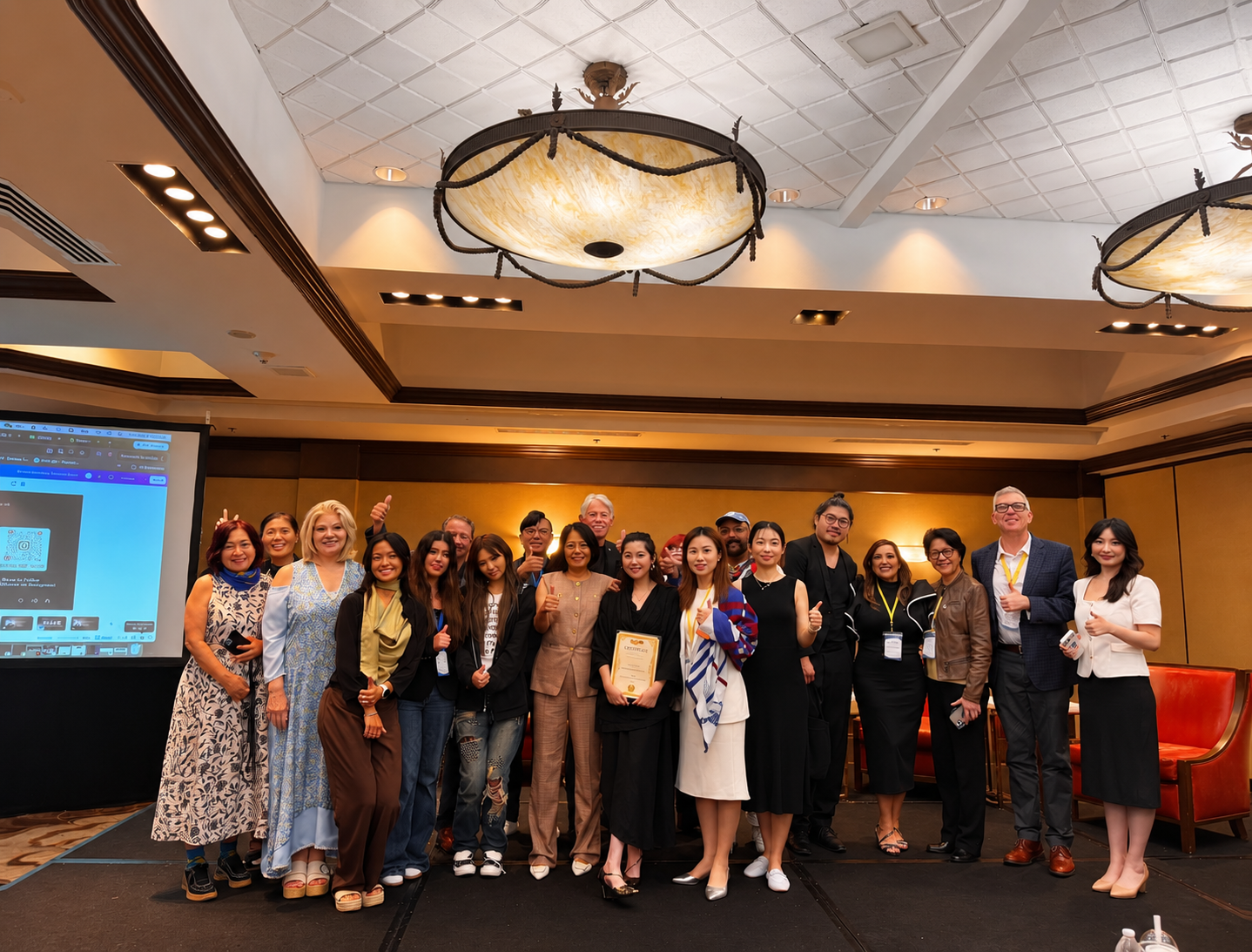 Group photo of participants at the 2026 North America Investment Summit in Orange County, with Pet Art holding its Certificate of Recognition.