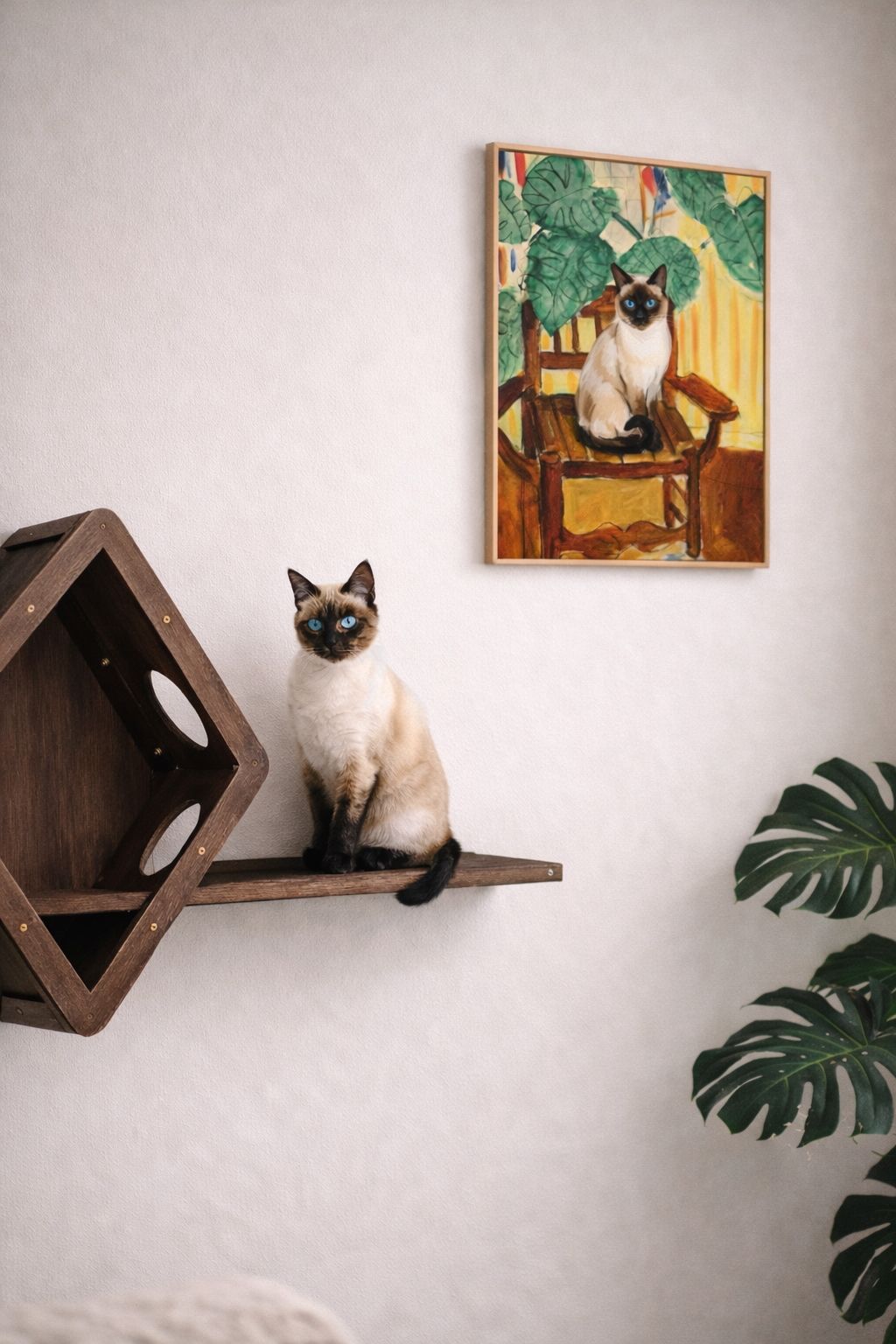 minimalist cat wall shelf with framed cat artwork creating a modern cat lover wall decor