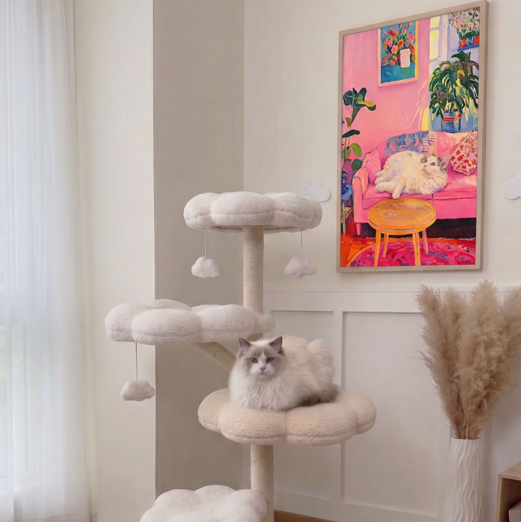 Pink Sofa framed cat artwork hung as living room wall art above a cloud-shaped cat tree