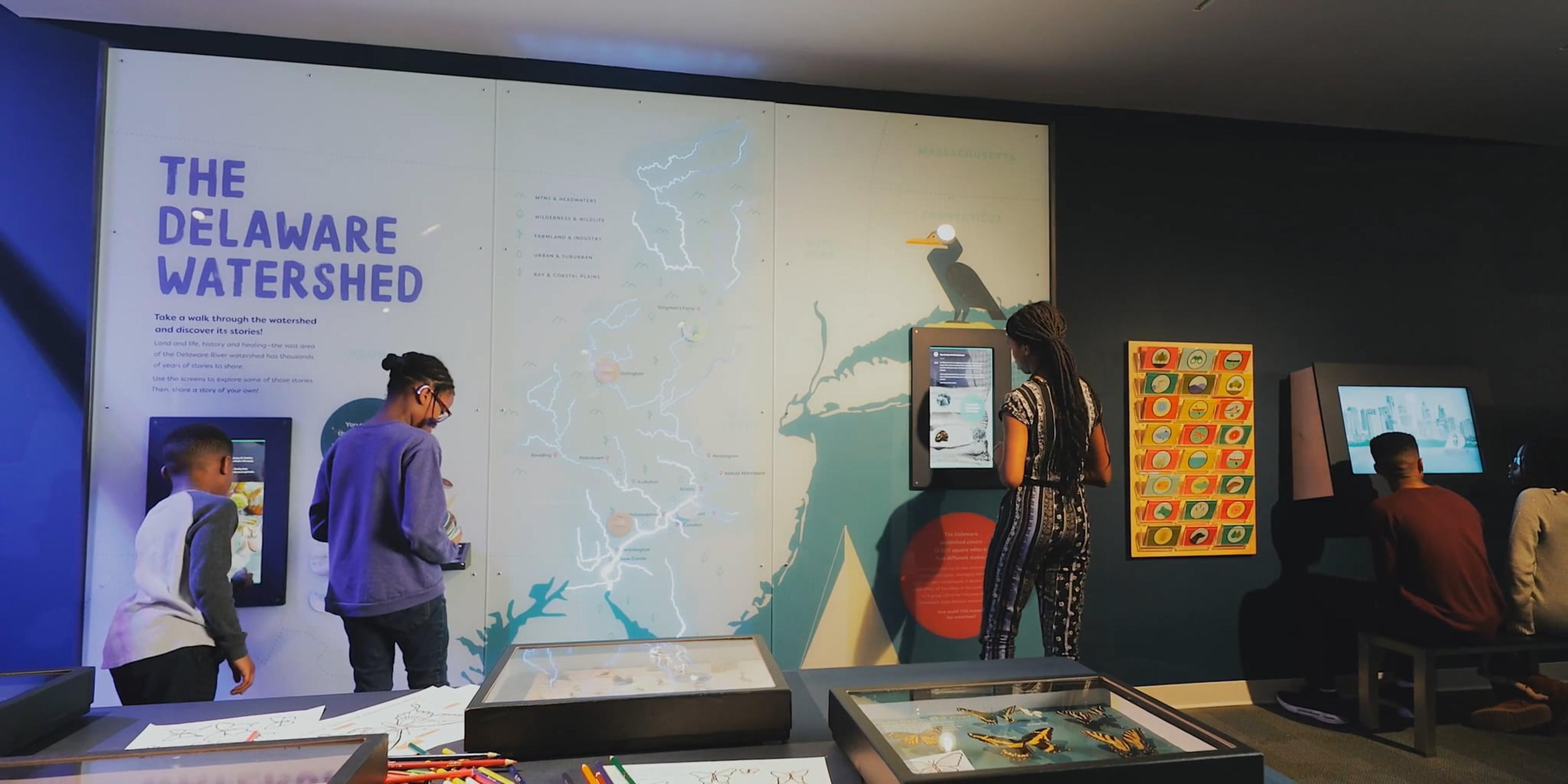 Set into a larger map of the watershed, a touchscreen takes visitors on an in-depth journey through the river’s history