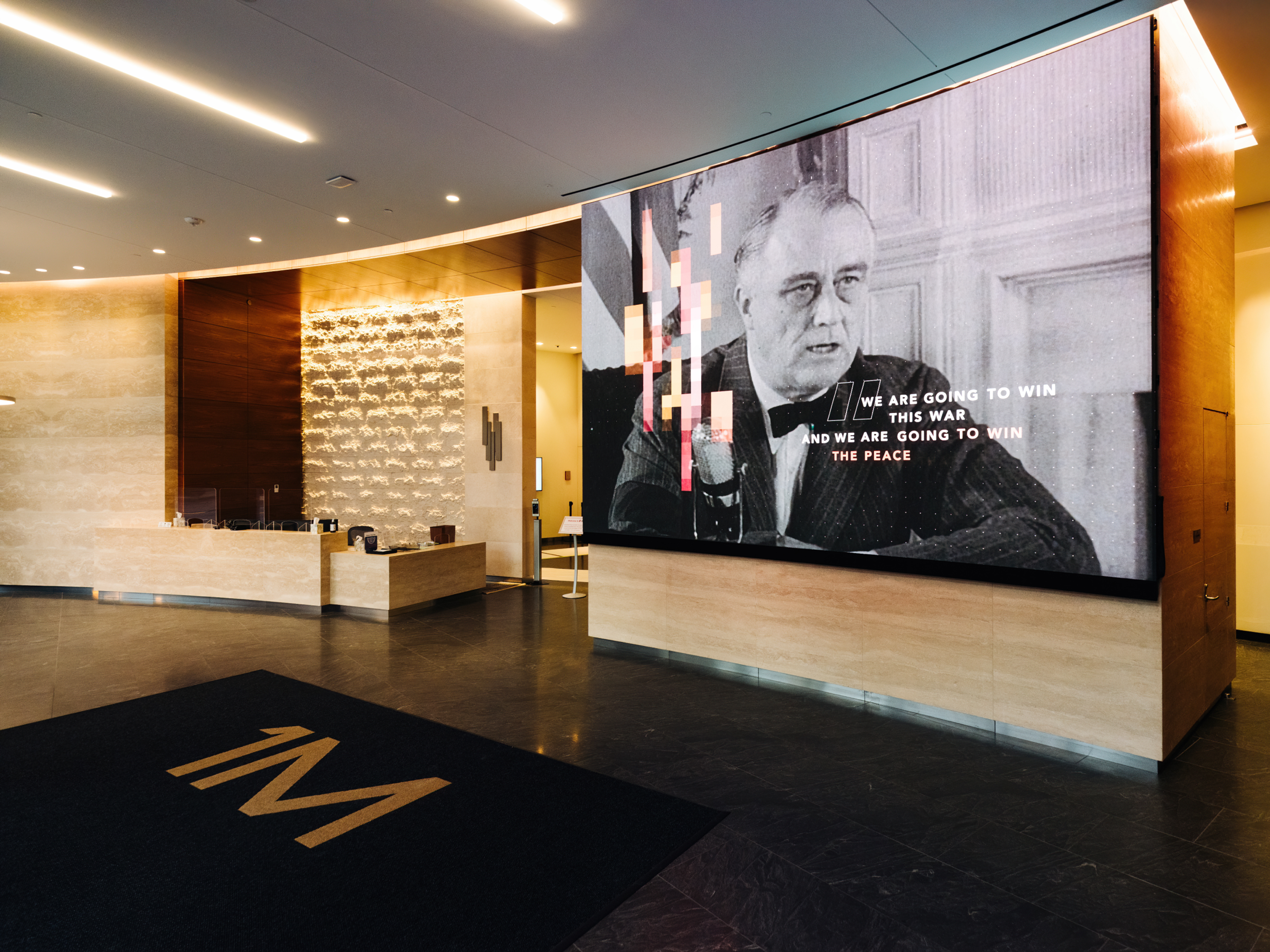 NAB's new HQ features engaging digital experiences: a 17x12 ft video wall and a five-panel touchscreen.