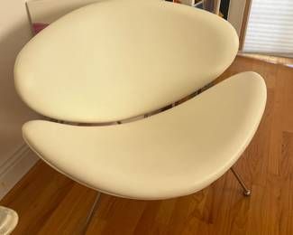 Off-white Pierre Paulin Orange Slice chair by Artifort, featured as a designer furniture highlight in a Studio City estate sale.