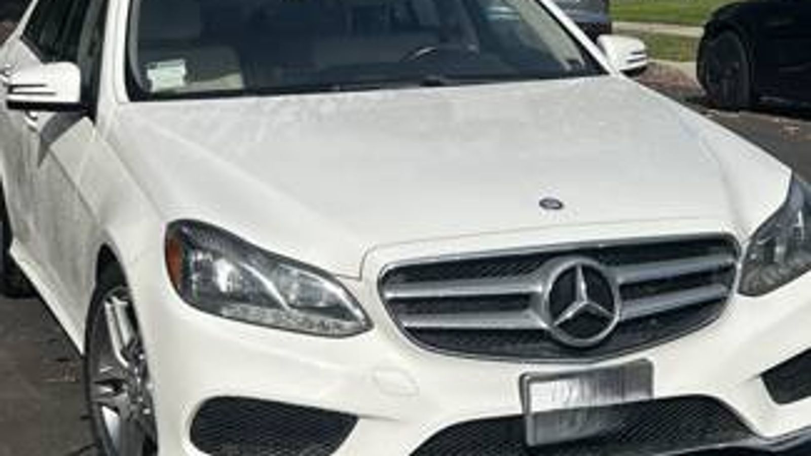 White 2016 Mercedes-Benz E 350 sedan with tan interior, featured as a pre-sale automobile highlight in a Studio City estate sale.
