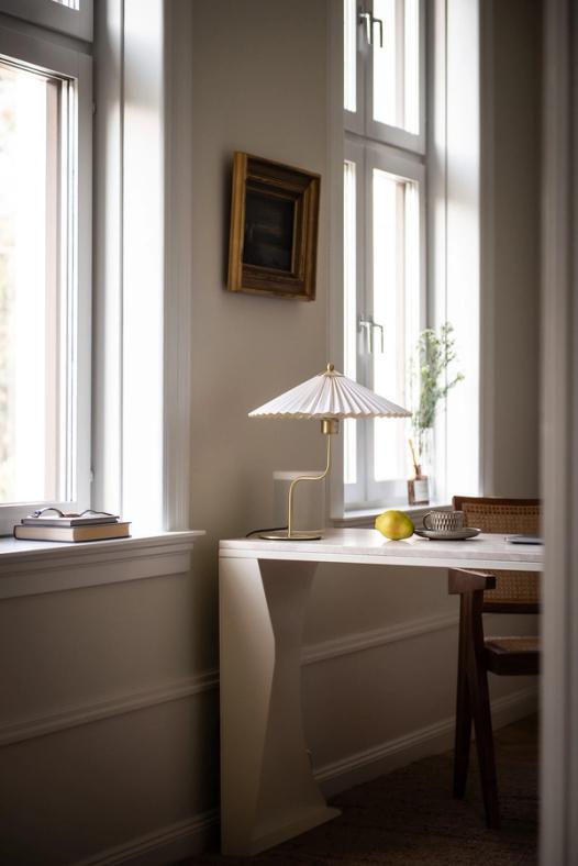 Desk with steel legs and travertine top
