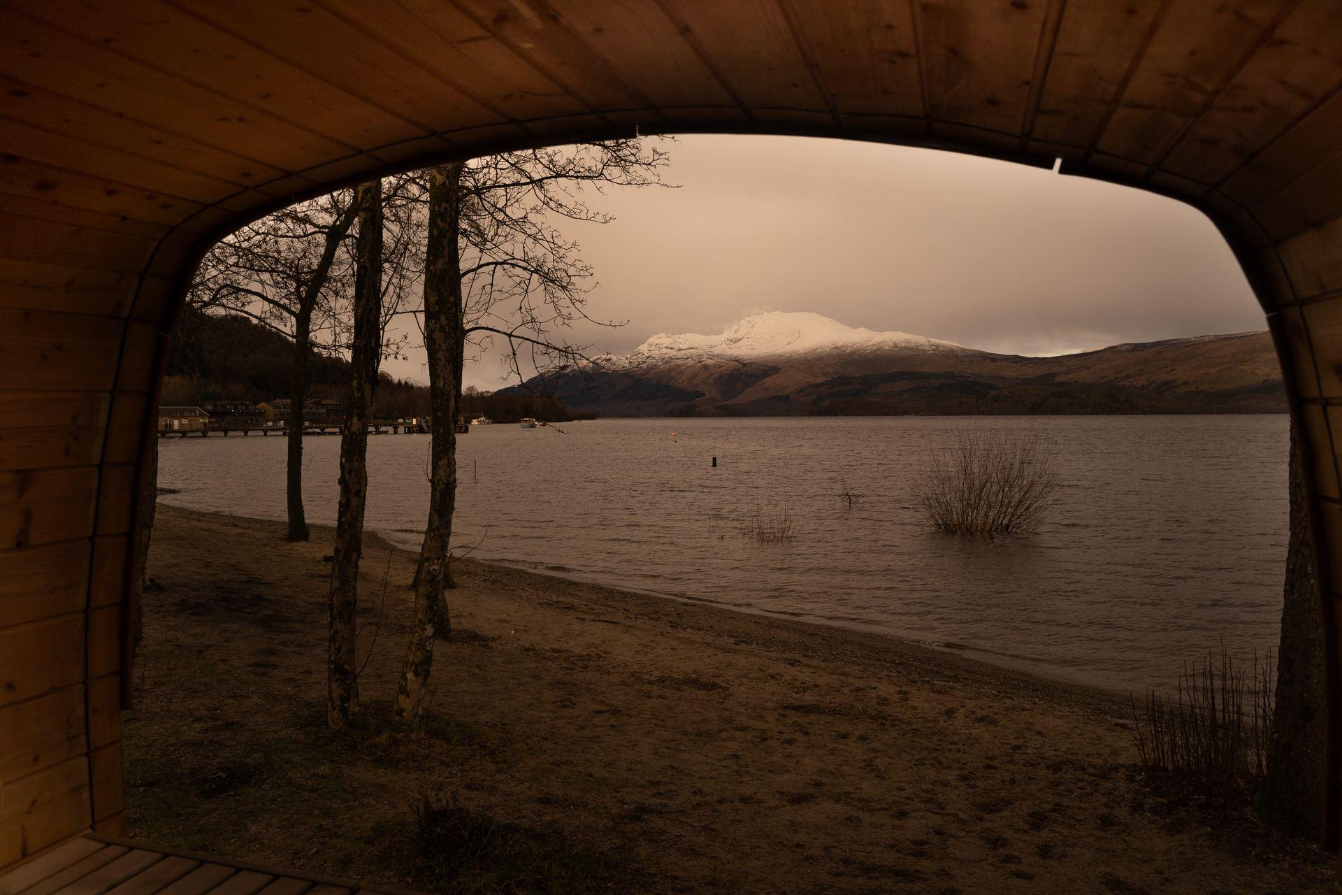 Hot Tottie sauna beside the Lifeboat House at Luss with Ben Lomond behind