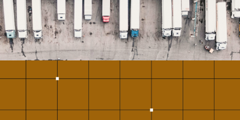 trucks parked at a loading dock