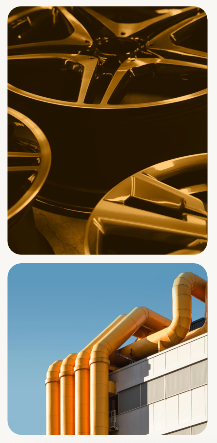 Mustard-toned close-up of an alloy wheel paired with industrial smokestacks