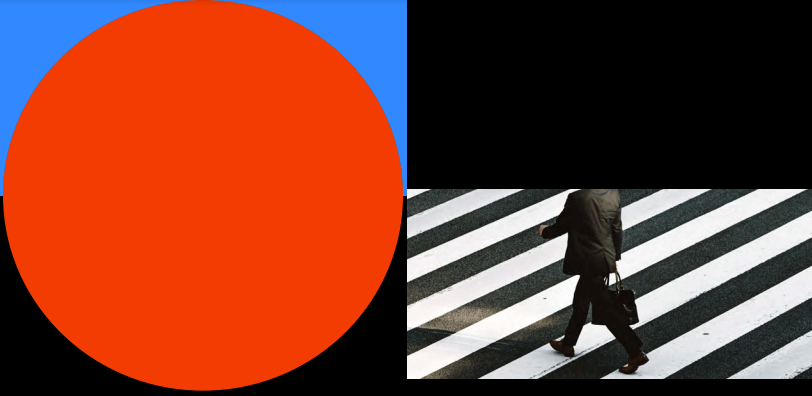 A man walking across a crosswalk with a briefcase