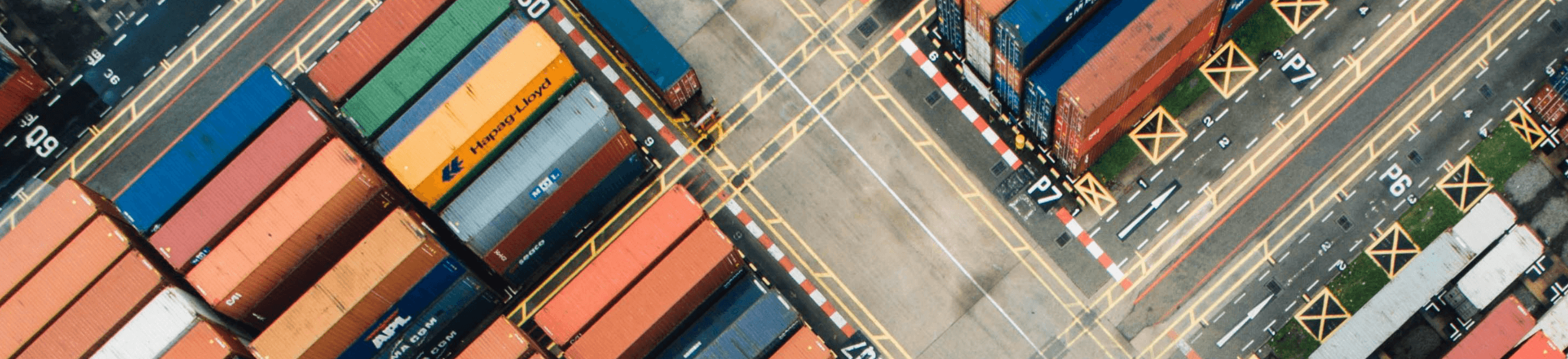 Containers seen from above in a shipping dock