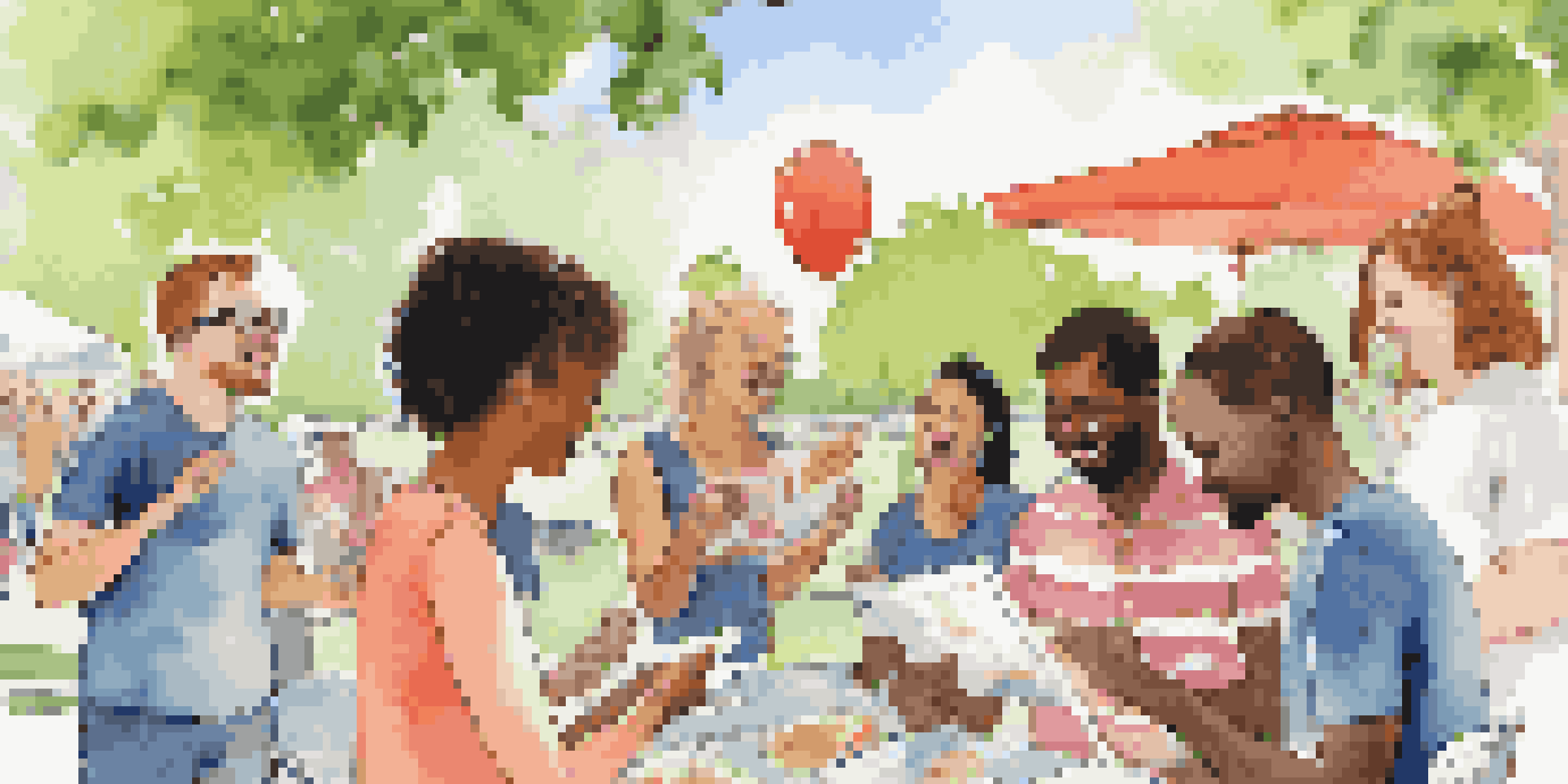 A diverse group of people at a food allergy awareness event in a park, holding pamphlets and engaging in conversation.