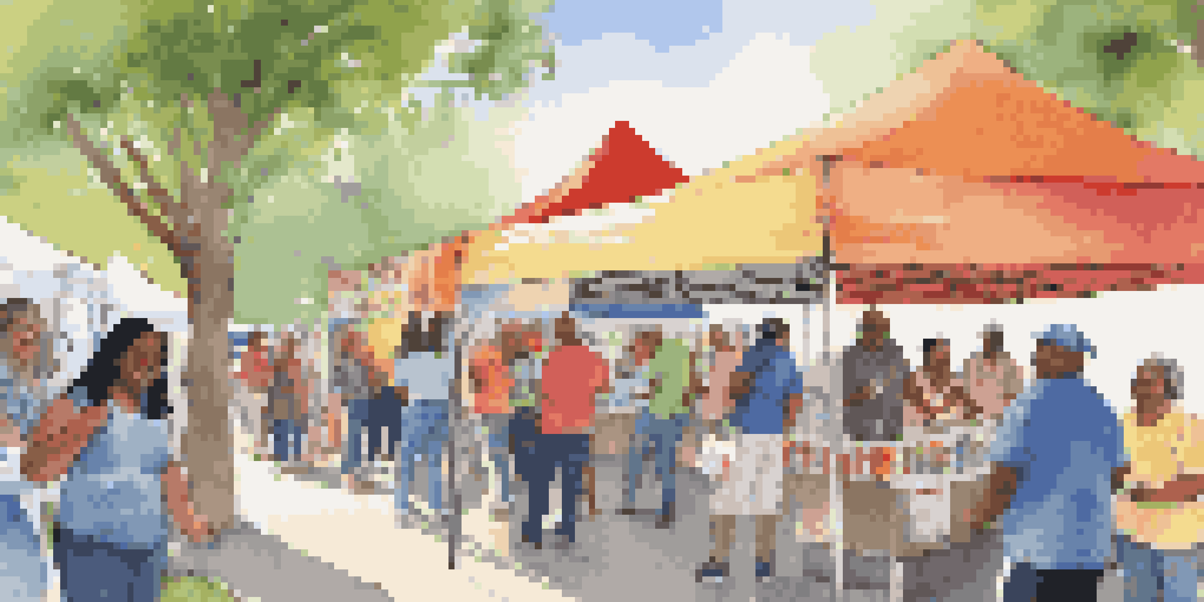 A lively community health fair with diverse participants, colorful banners, and volunteers assisting at booths.