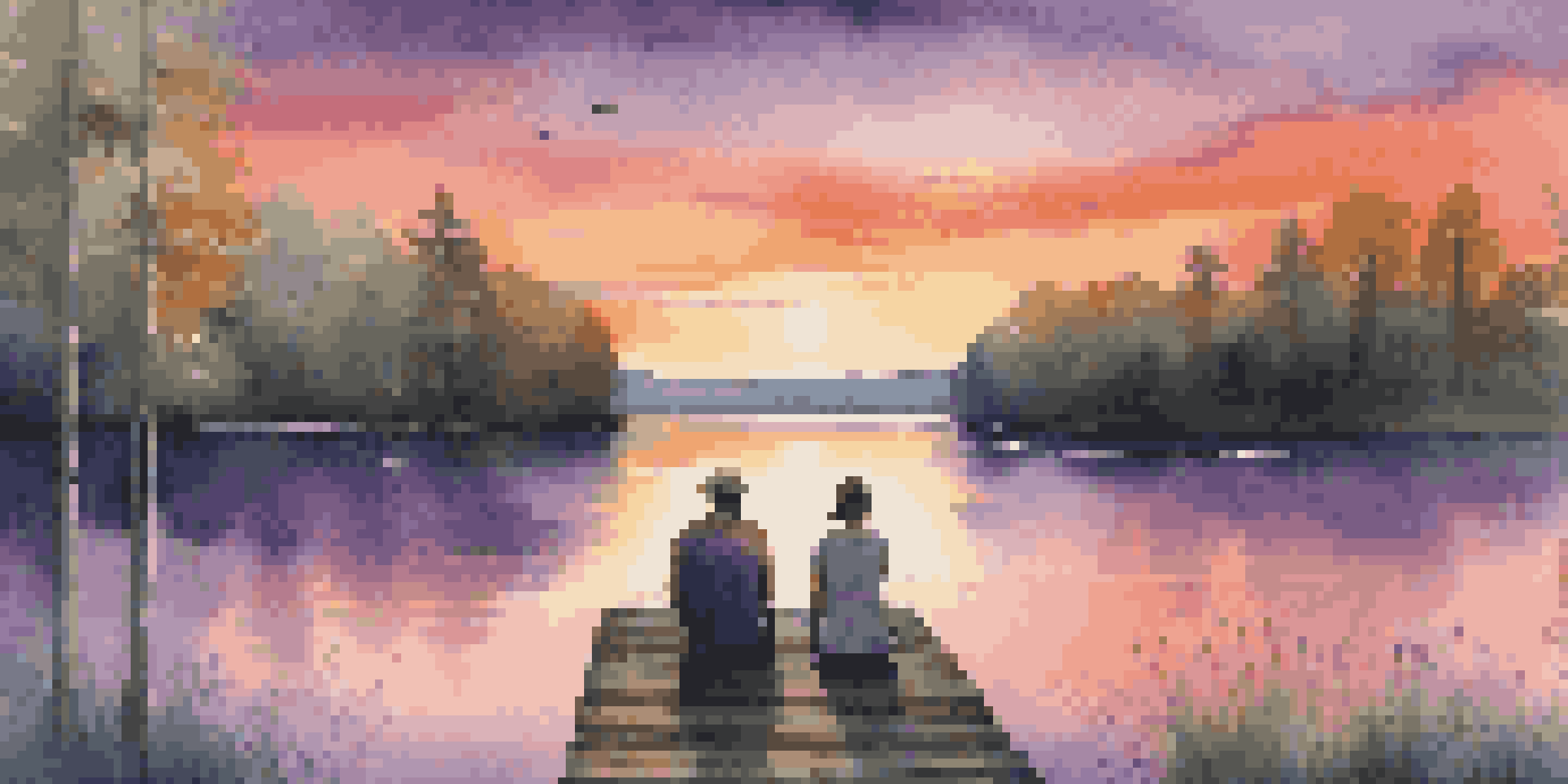 A couple sitting on a wooden dock by a calm lake at sunset, surrounded by greenery.