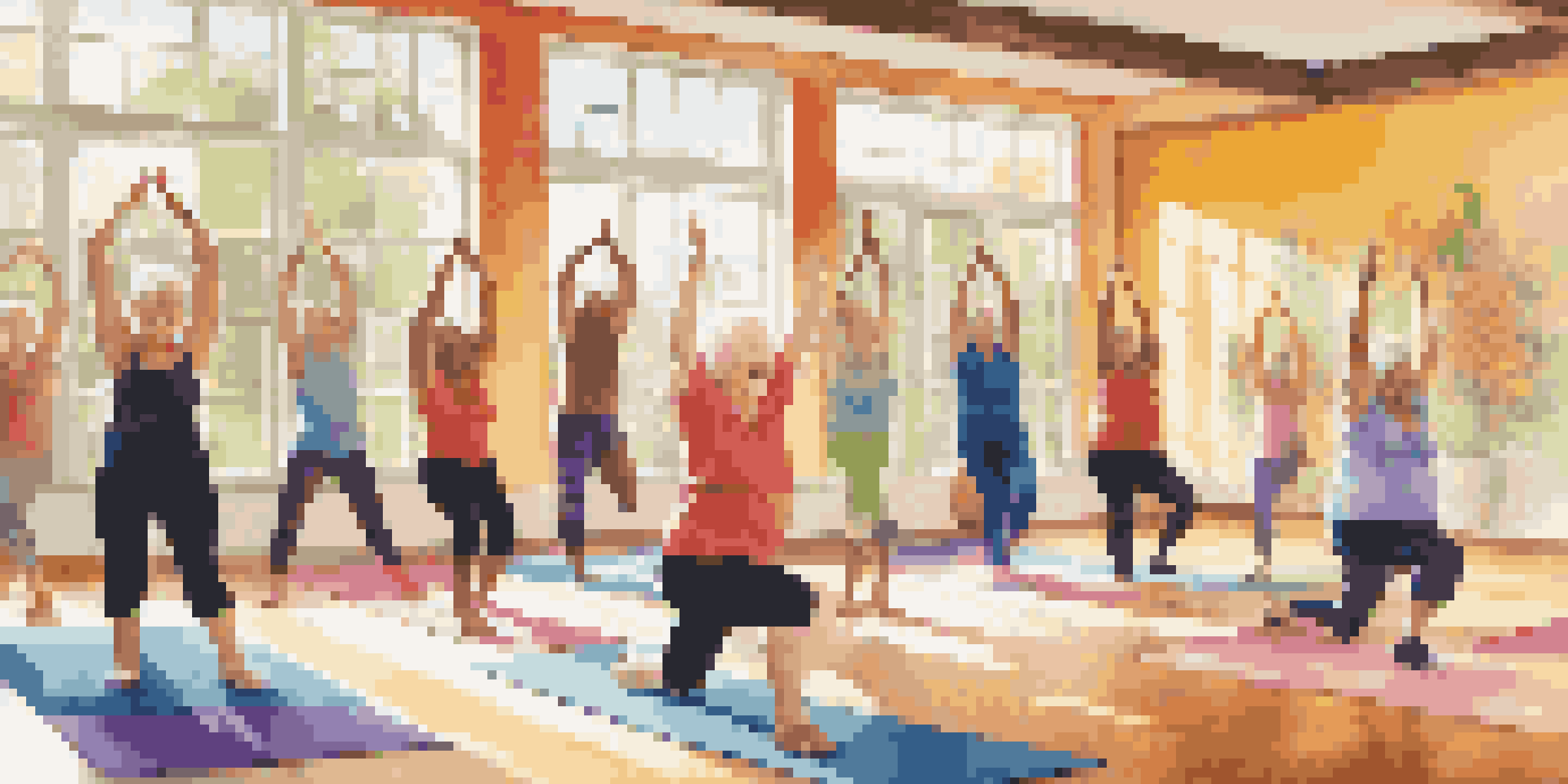 Seniors participating in a joyful yoga class in a bright community center with sunlight pouring in.