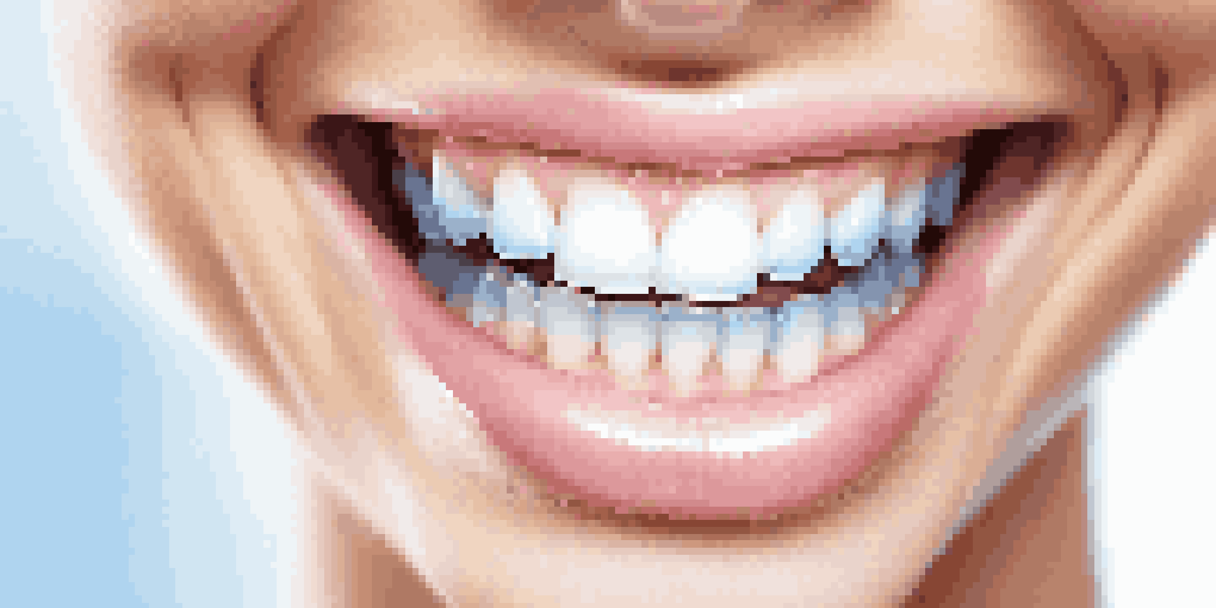 A close-up of a person smiling, displaying clean teeth and healthy gums, with soft lighting and a blue background.