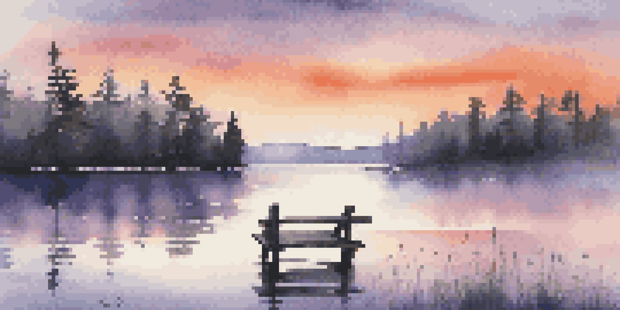 A peaceful sunrise over a calm lake with colorful reflections and a silhouette of trees.
