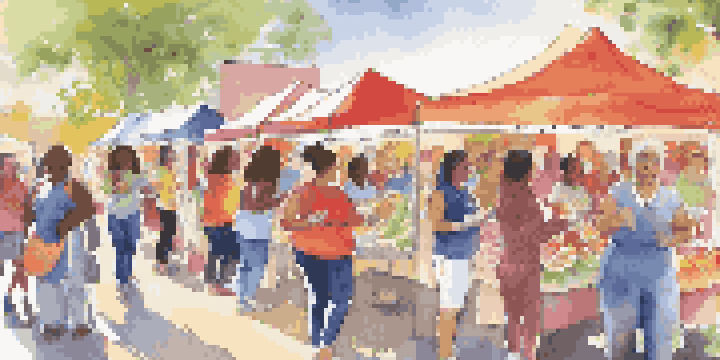 A lively community health fair featuring women from different backgrounds participating in health activities, with colorful booths and a sunny atmosphere.