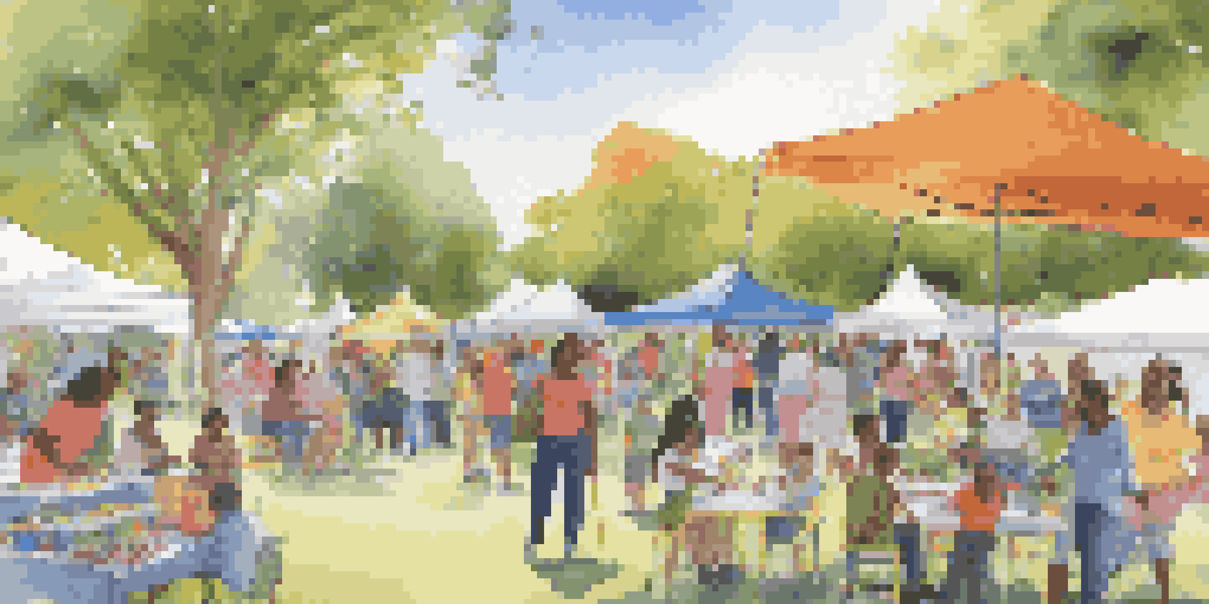 A community health fair in a park with diverse people engaging in health activities, colorful booths, and fitness demonstrations.