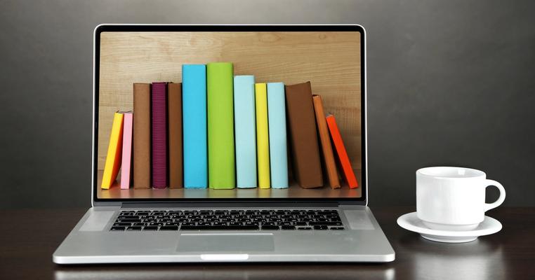 Laptop met plaatje van boeken erop