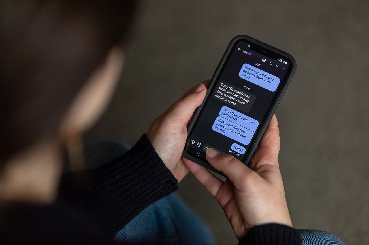 Close up of messages on a mobile phone