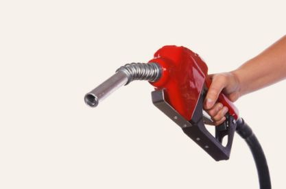 A red fuel pump nozzle