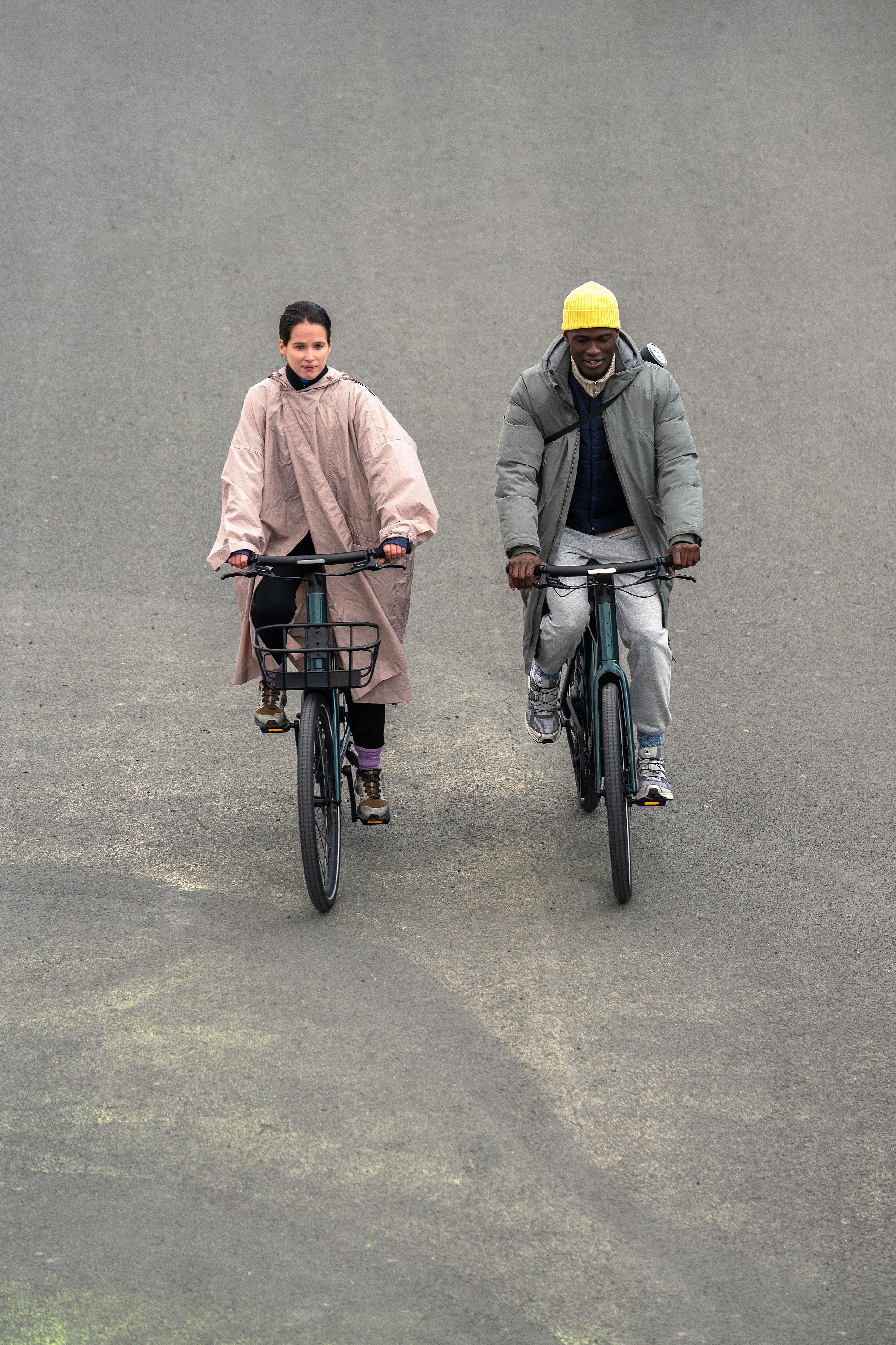 Two women riding Motto bikes