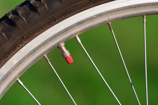 Bike tire valve ready for measuring the tire pressure