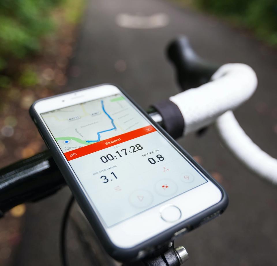 Phone mounted on road bike running Strava