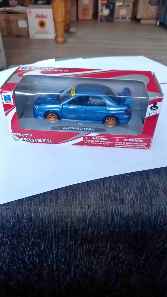 NEWRAY 1:32 Subaru wrx die cast R200