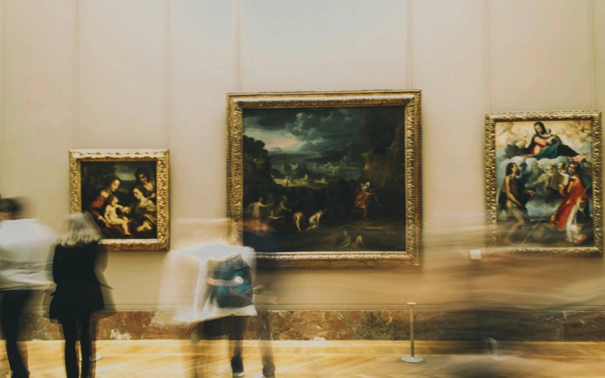 People looking at art in a museum