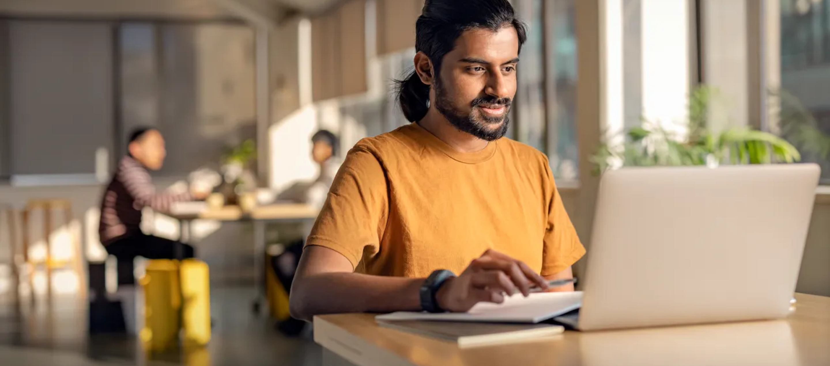 A student using a laptop