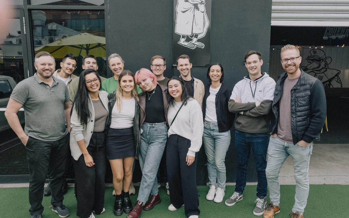 Voyage team photo after ping pong tournament