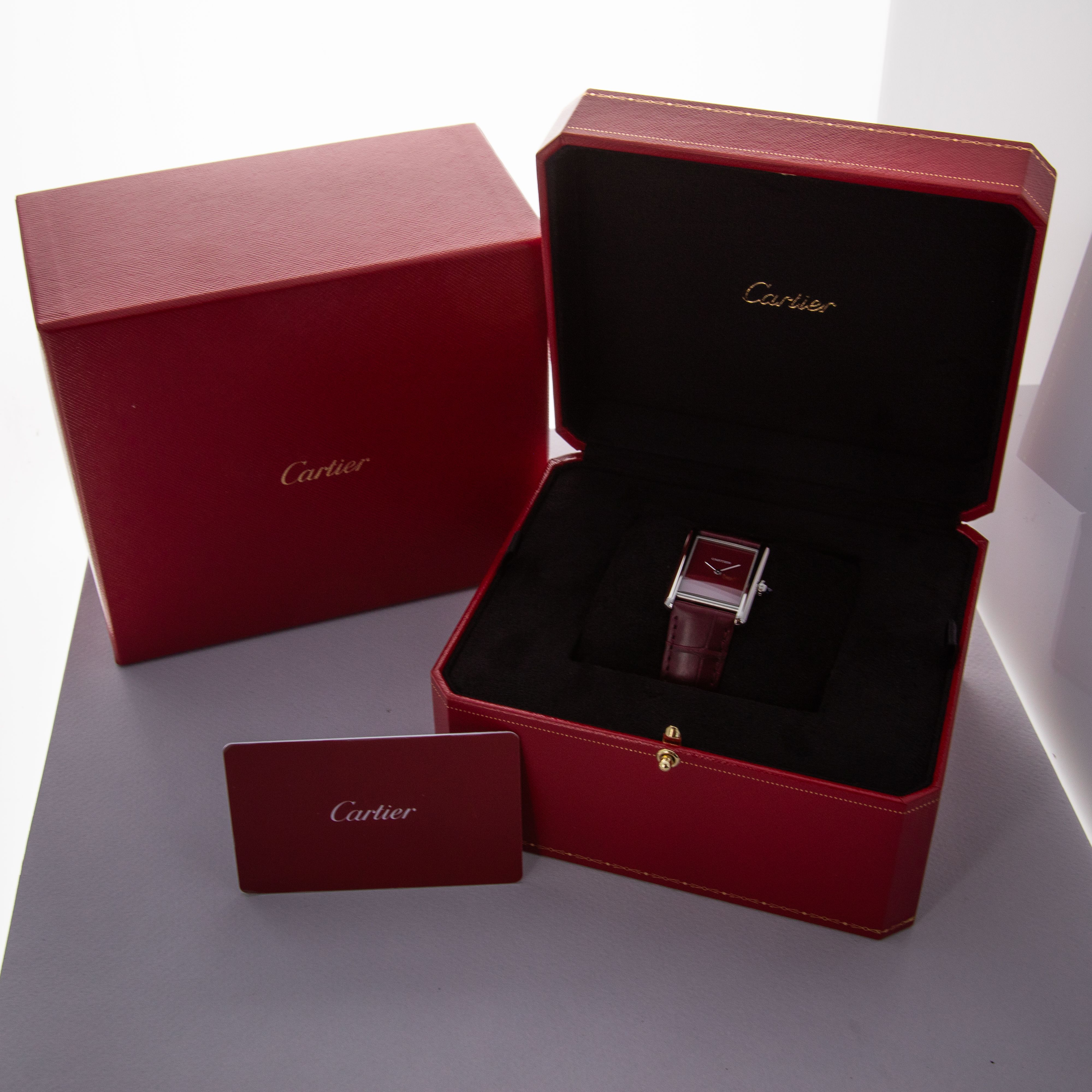 Cartier Must De Cartier Tank WSTA0054 Red Dial | Auctions | Loupe This